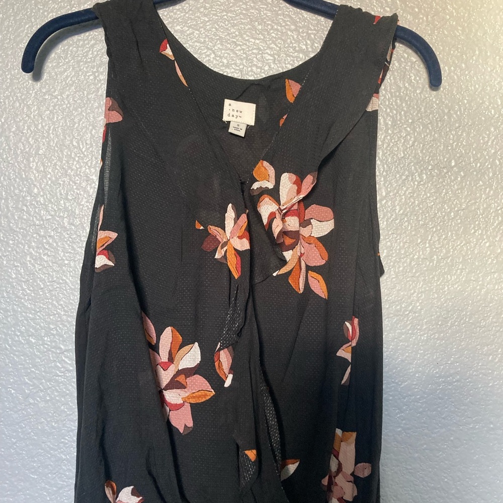 Black floral sleeveless blouse
